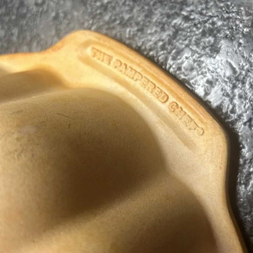 10” Pampered Chef bundt cake stone. This is almost 100% seasoned. Exc condition